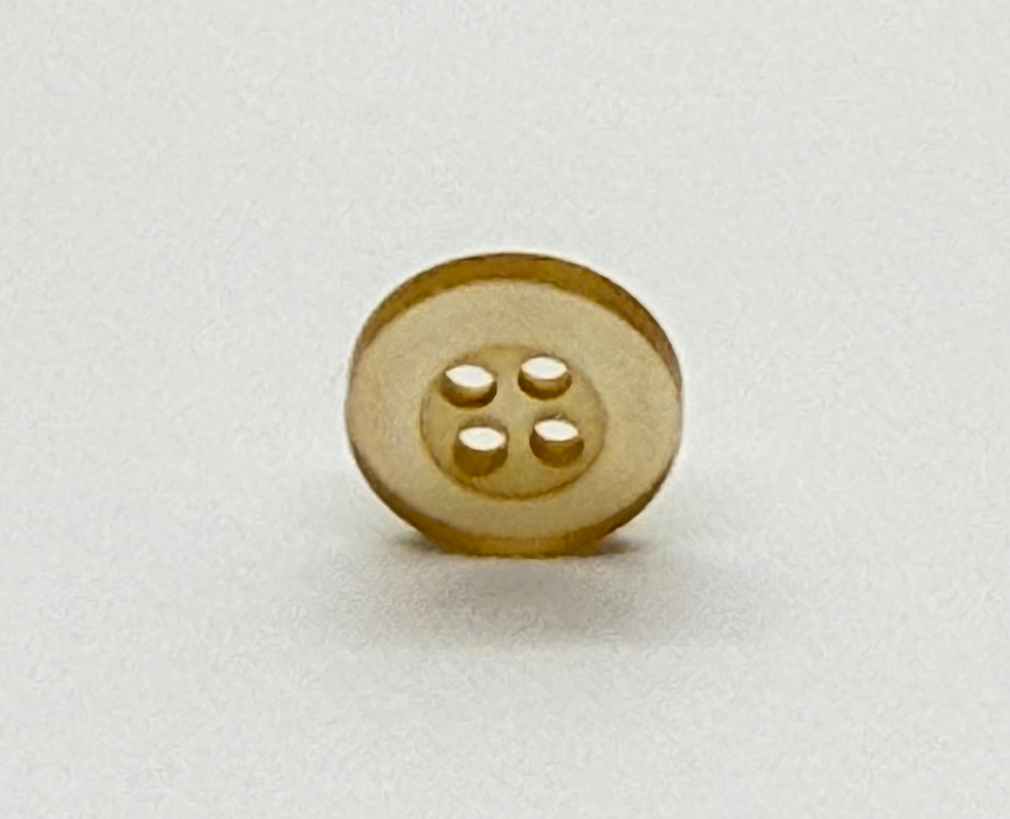 Close-up image of Balsa Cream Resin, a premium quality button.