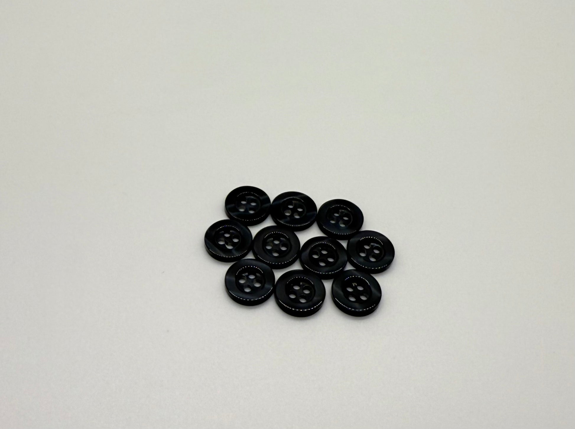 Close-up image of Super Dark Navy Resin, a premium quality button.