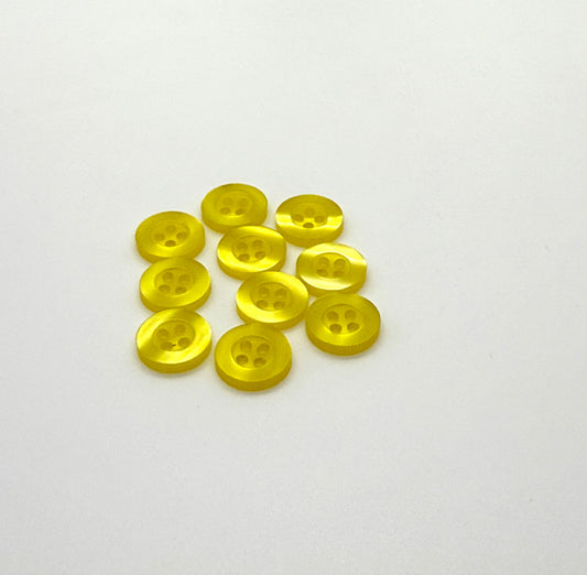 Close-up image of Yellow Resin, a premium quality button.
