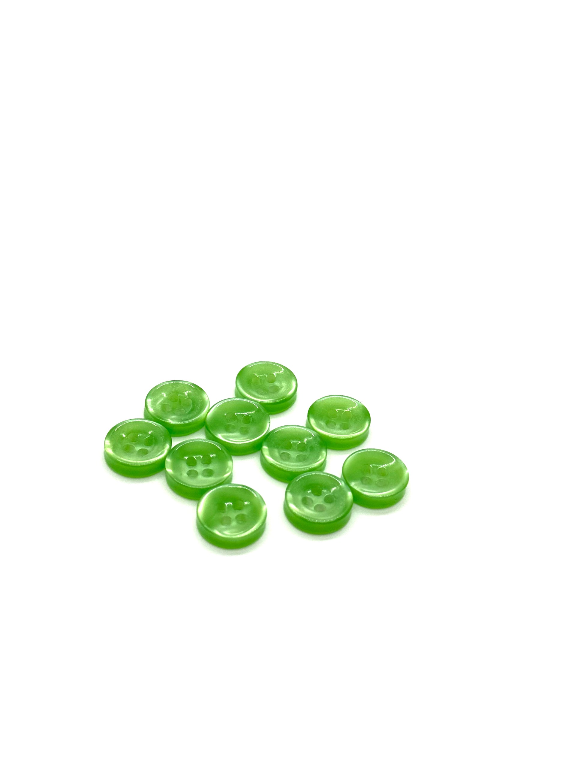 Close-up image of Green Iridescent 4-hole Button, a premium quality button.