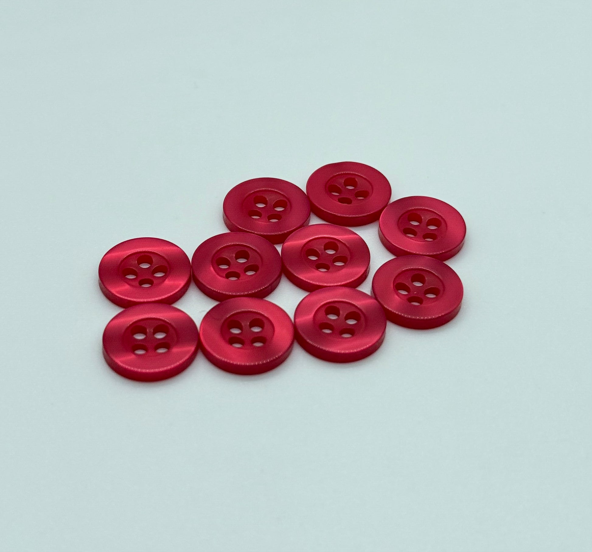 Close-up image of Rose Resin 4-Hole Button, a premium quality button.