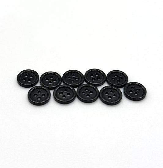 Close-up image of Black Pie Crust Polymer Button, a premium quality button.