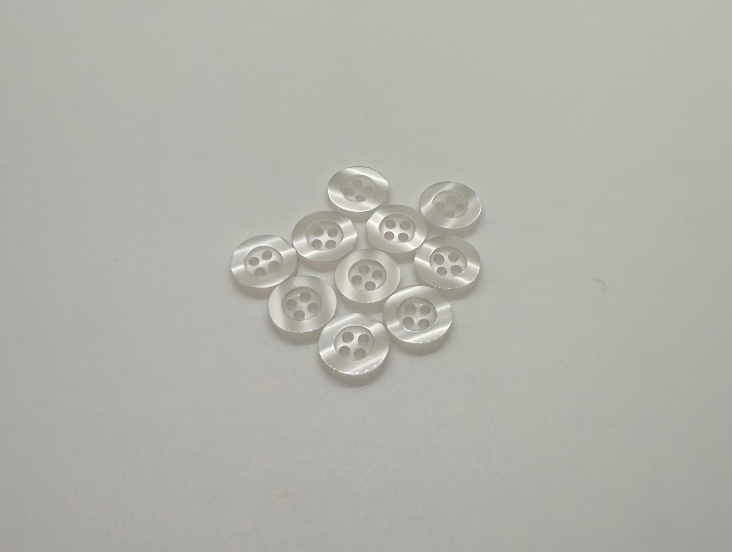 Close-up image of Ghost White Resin, a premium quality button.
