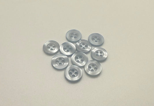 Close-up image of Pool water Blue Resin, a premium quality button.