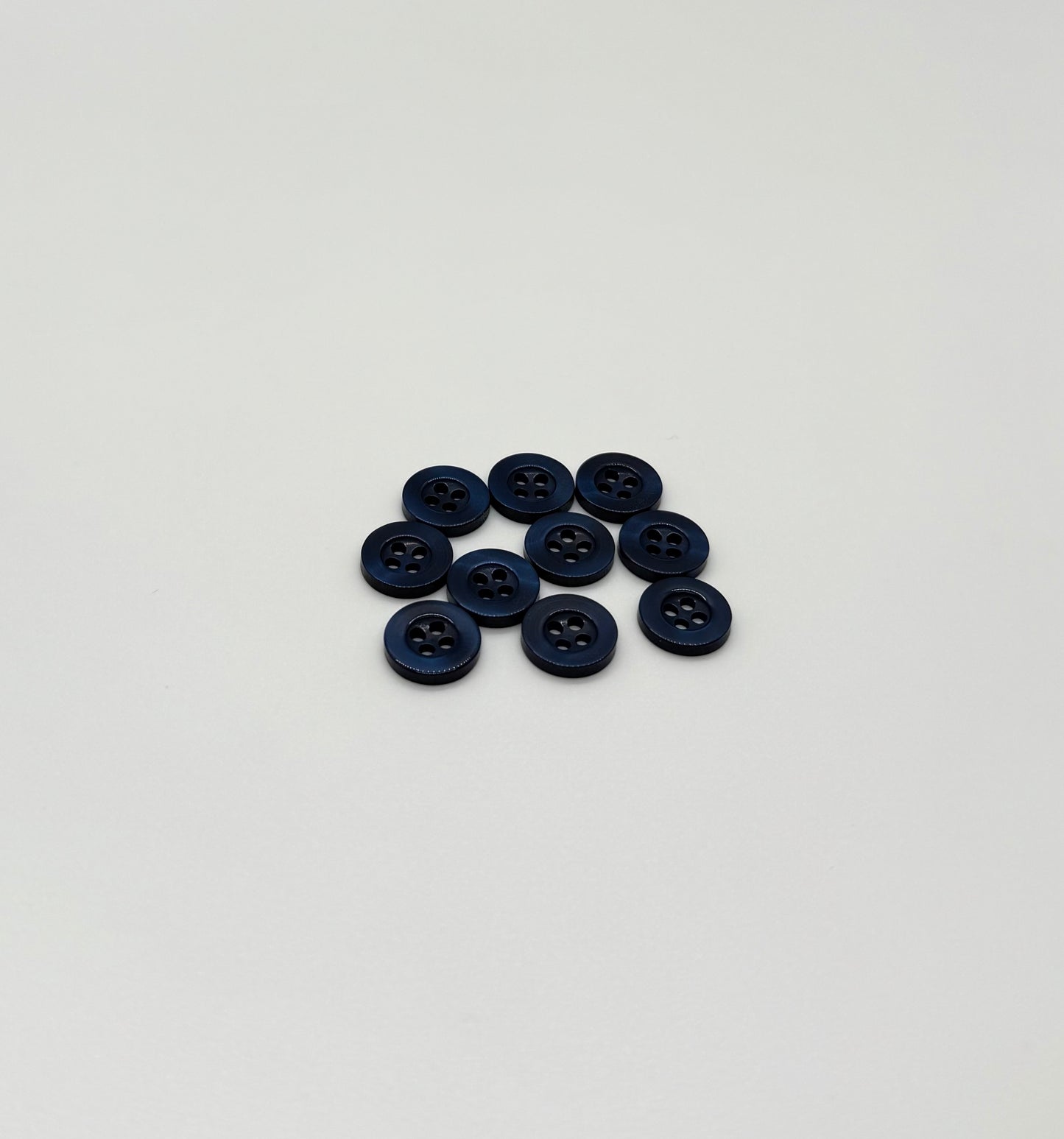 Close-up image of Deep Blue Resin, a premium quality button.