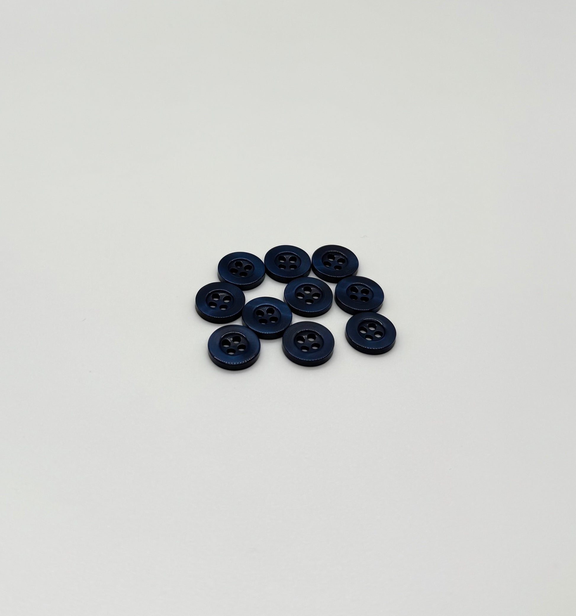 Close-up image of Deep Blue Resin, a premium quality button.