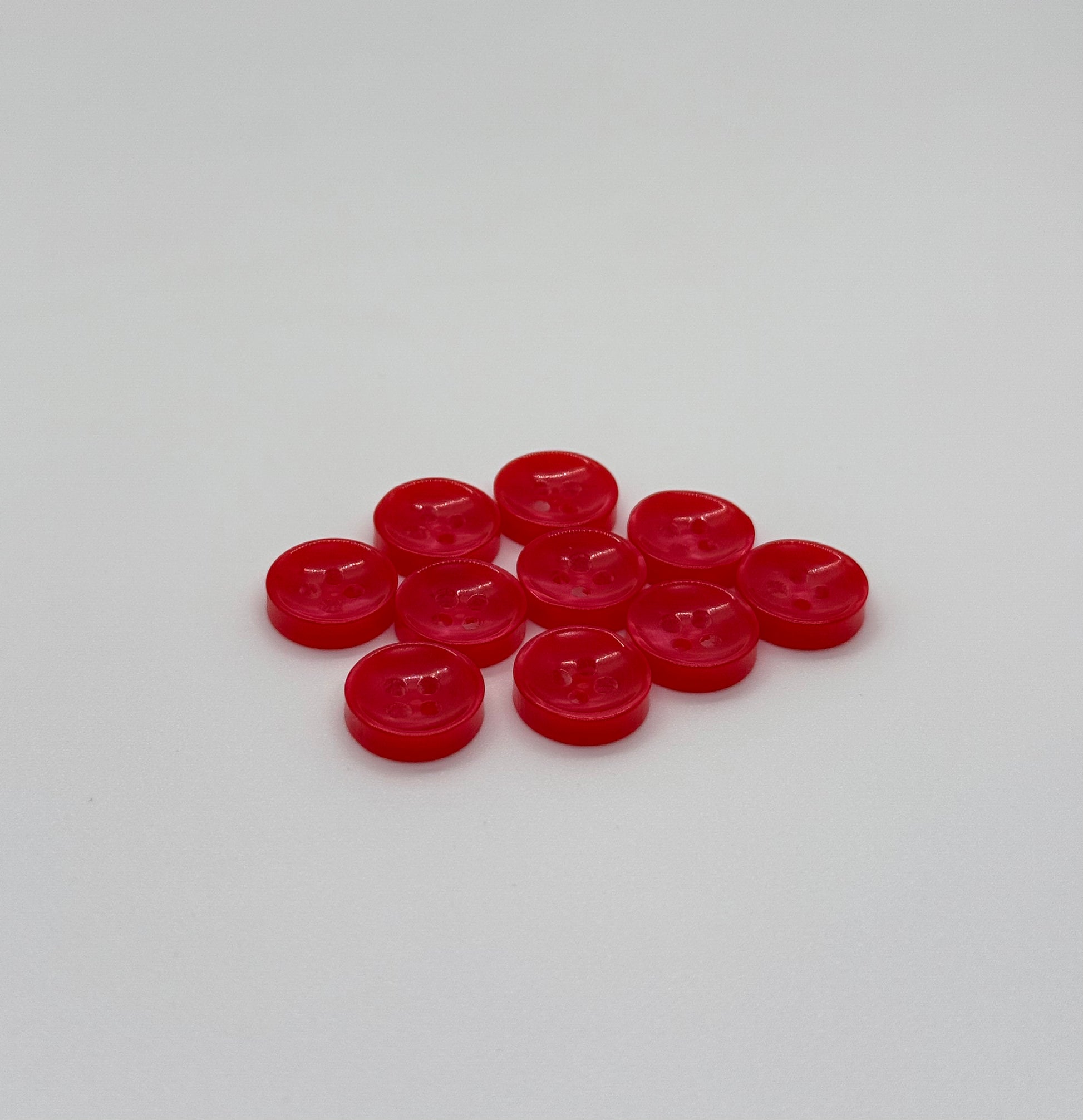 Close-up image of Red Sunken Button, a premium quality button.