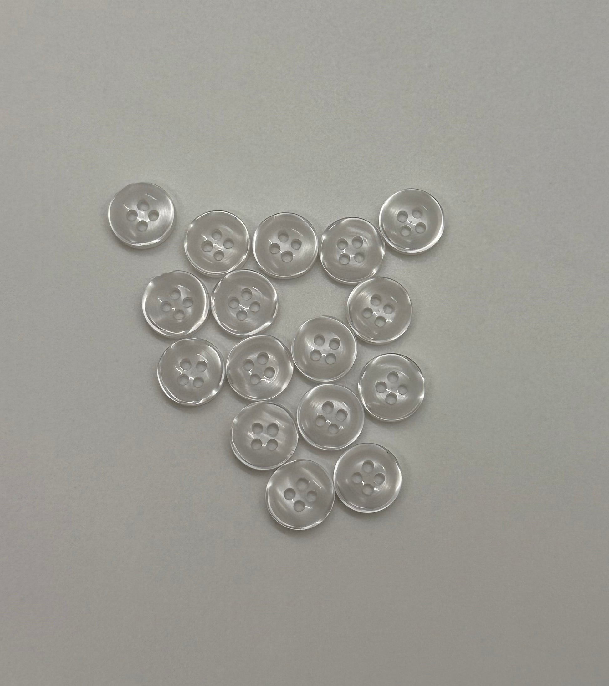 Close-up image of Faux Pearl - White Iridescent 18-Ligne Button, a premium quality button.