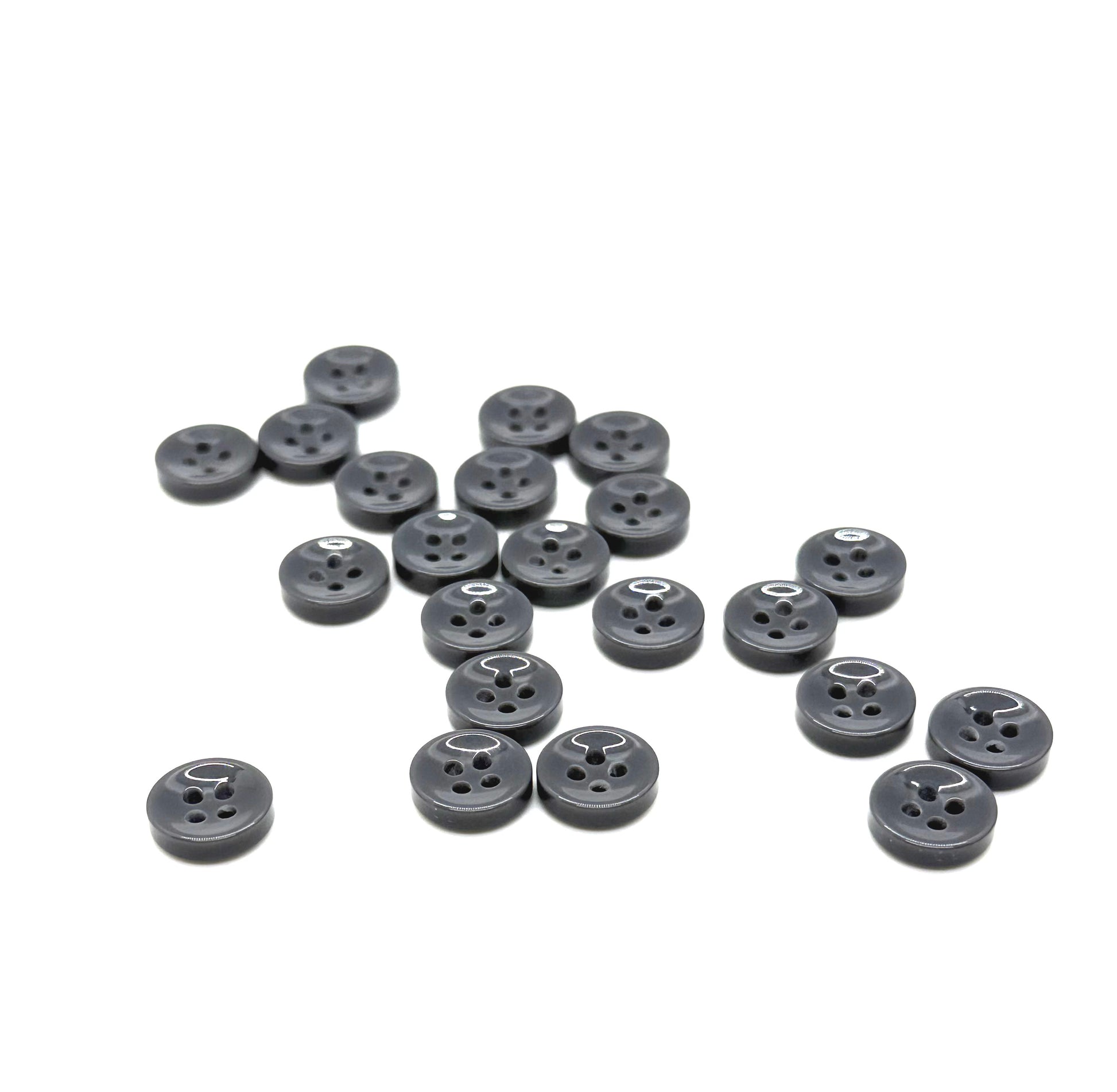 Close-up image of Grey Asphalt Fancy Resin 4-Hole Button, a premium quality button.