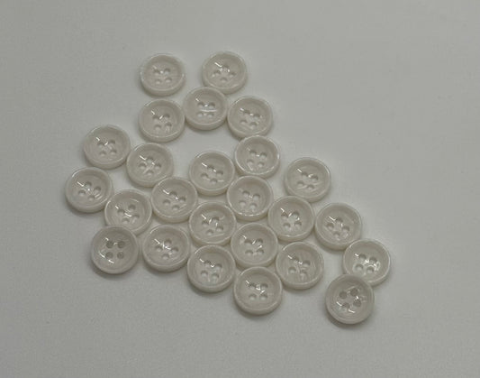 Close-up image of White Marble Crest Dimple Button, a premium quality button.