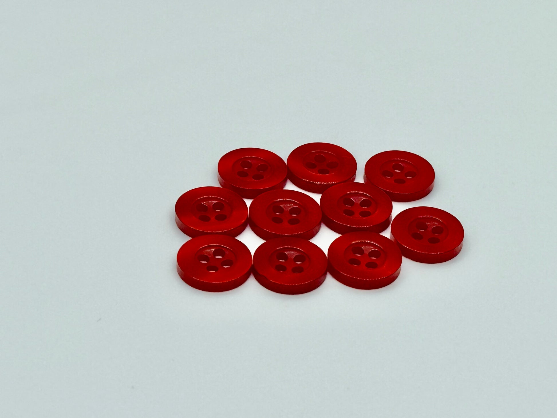 Close-up image of Blood Red Resin, a premium quality button.