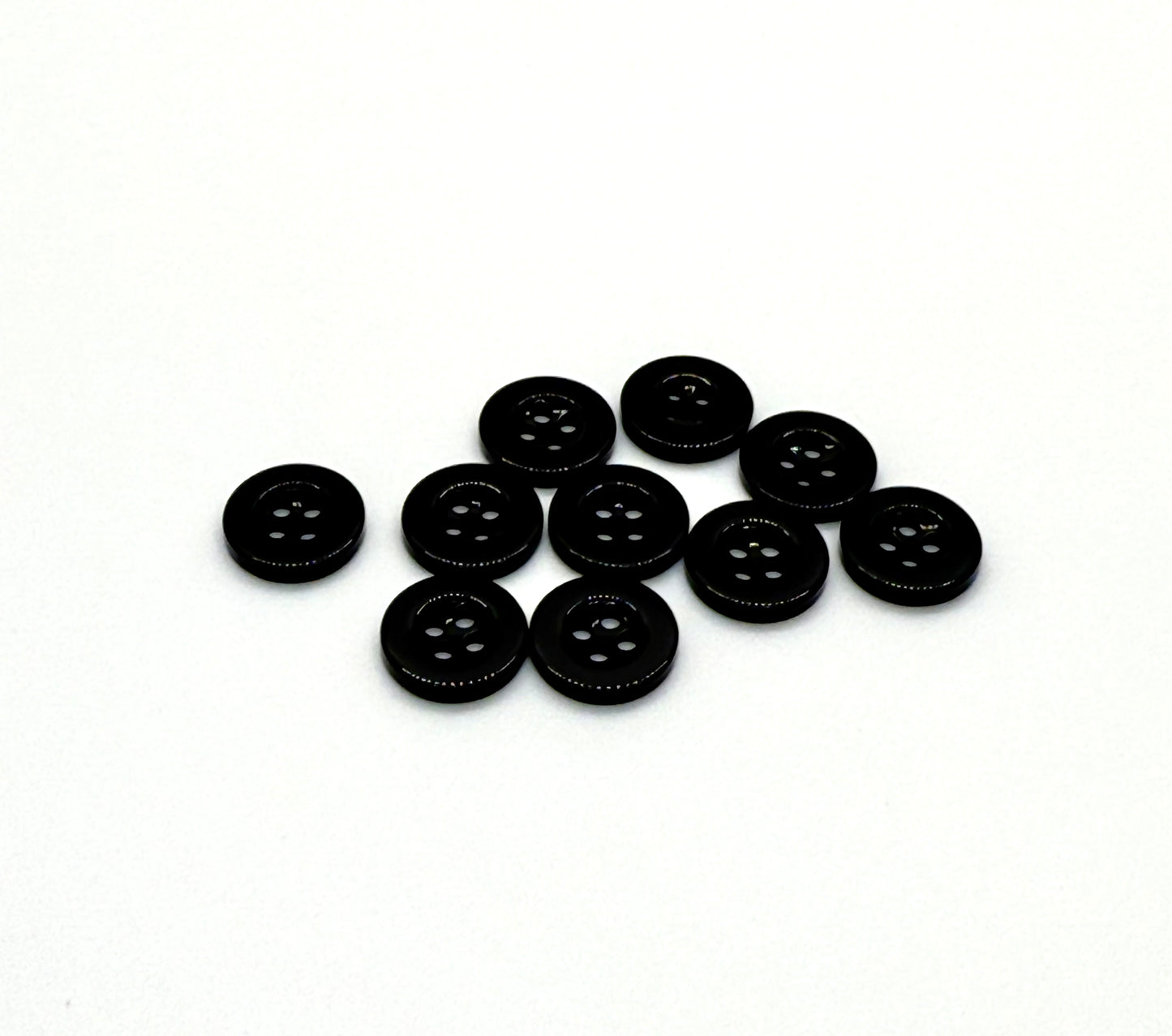 Close-up image of Black Sunken Resin, a premium quality button.