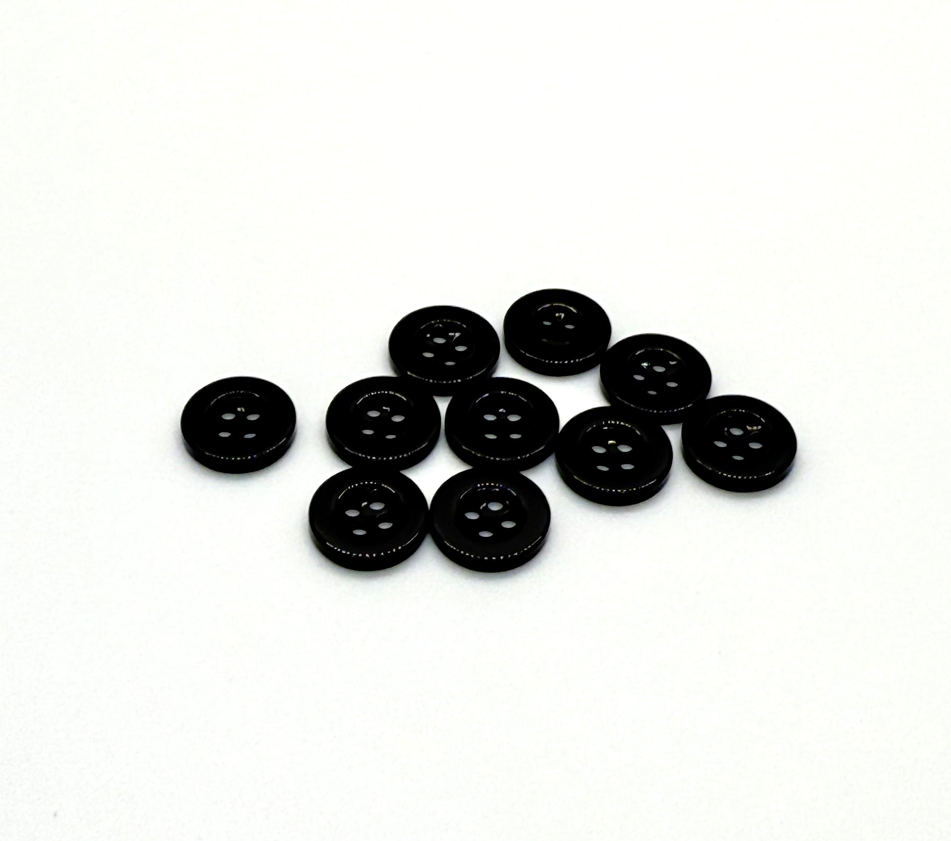 Close-up image of Black Sunken Resin, a premium quality button.
