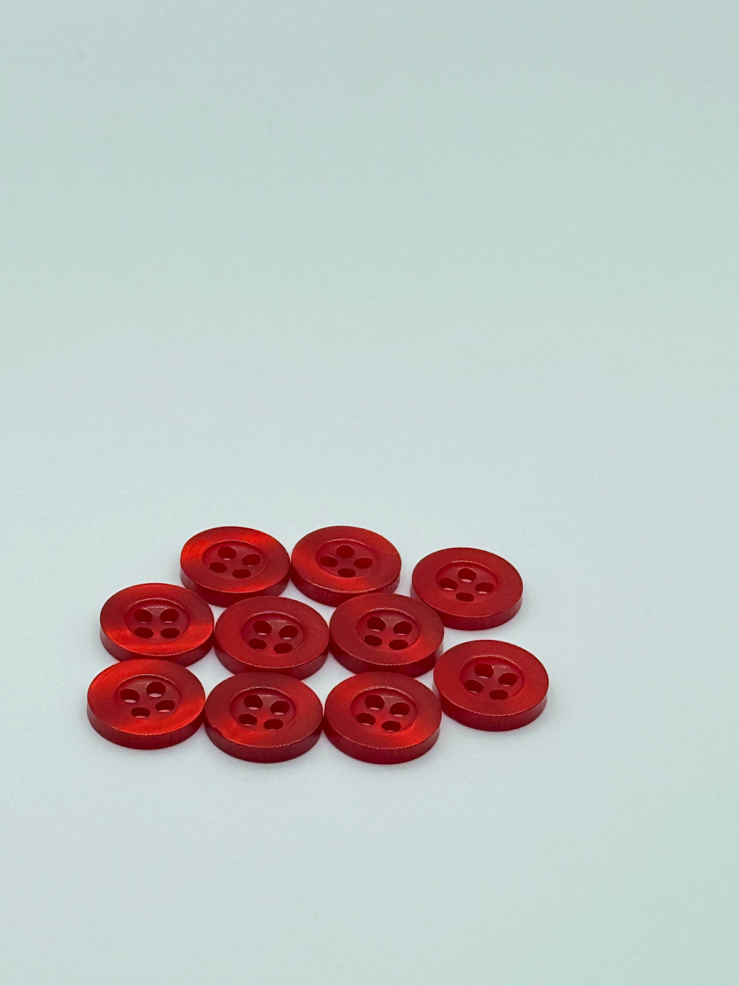 Close-up image of Blood Red Resin, a premium quality button.