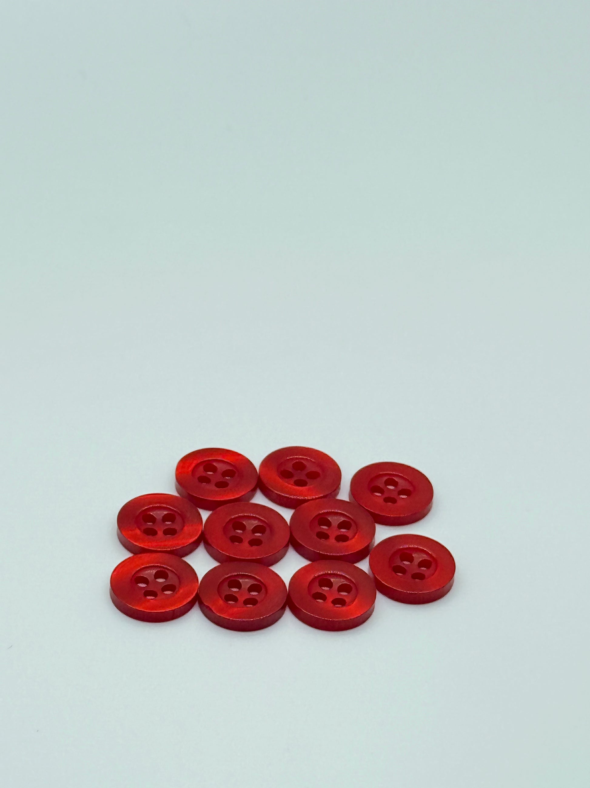Close-up image of Blood Red Resin, a premium quality button.