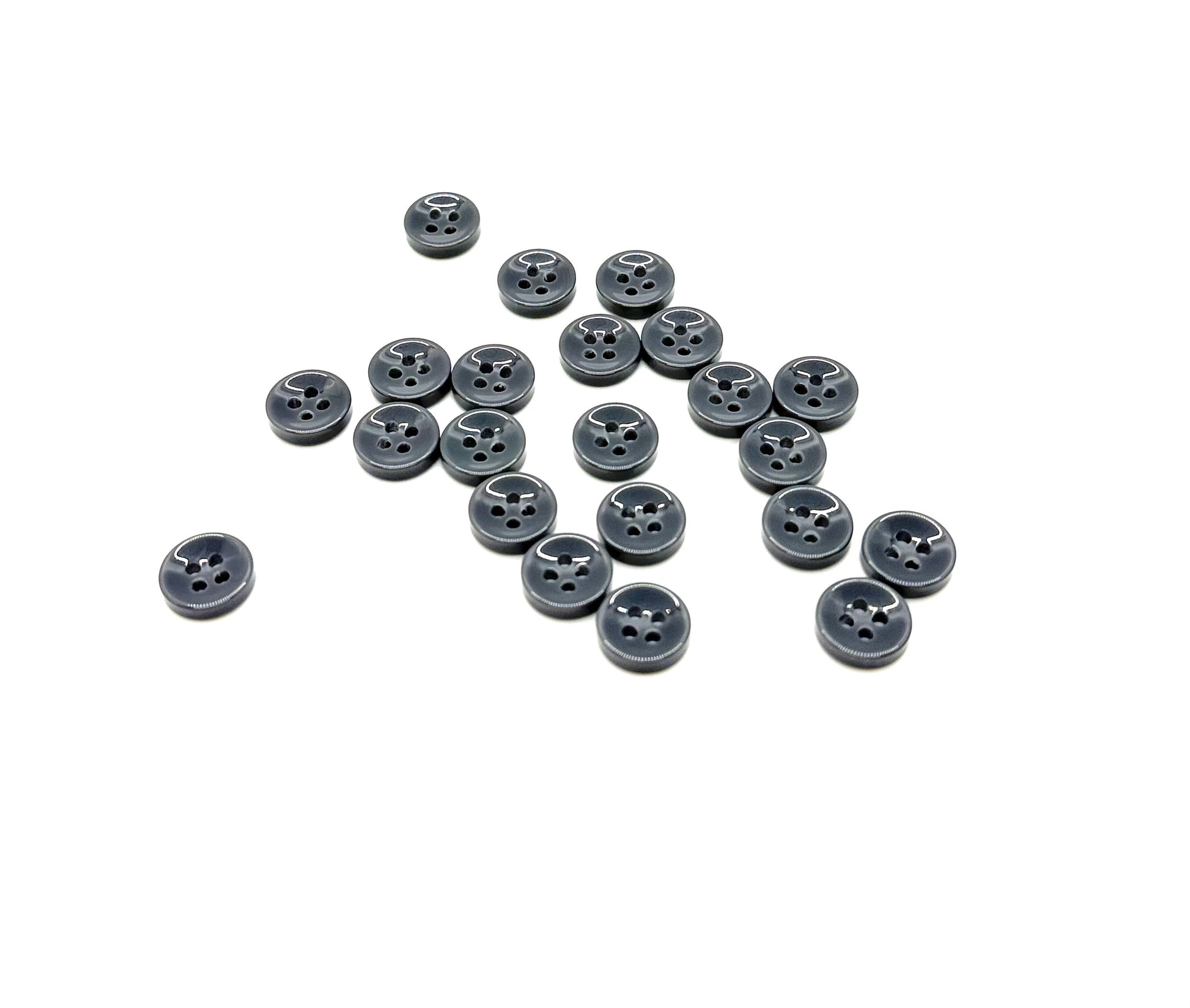 Close-up image of Grey Asphalt Fancy Resin 4-Hole Button, a premium quality button.