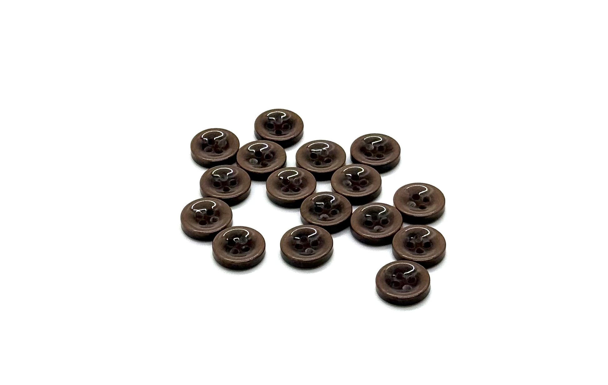 Close-up image of Mocha Drop 4-Hole Button, a premium quality button.